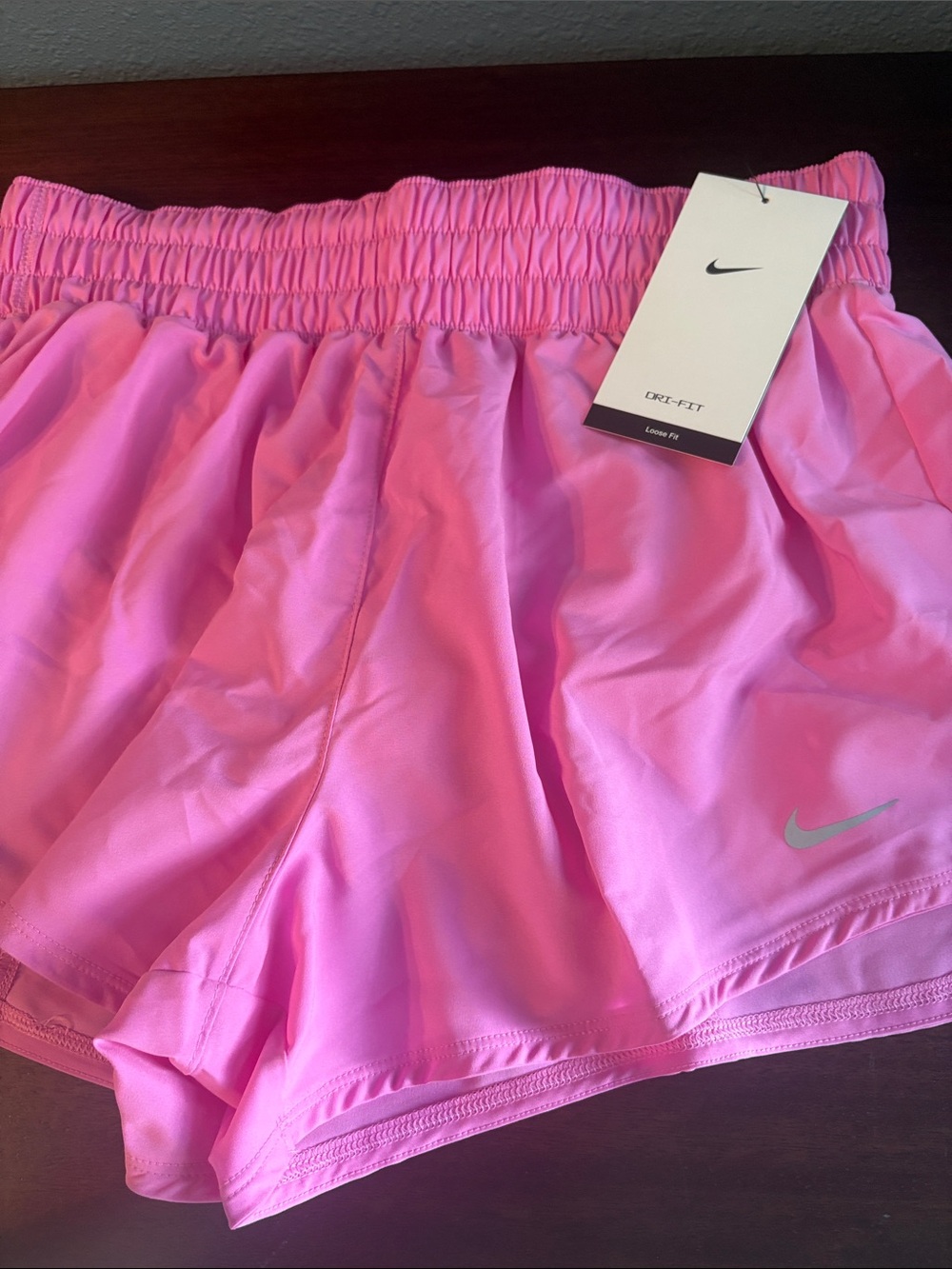 NIKE Women's Pink Athletic Running Shorts with Reflective Swoosh - Picture 9 of 16